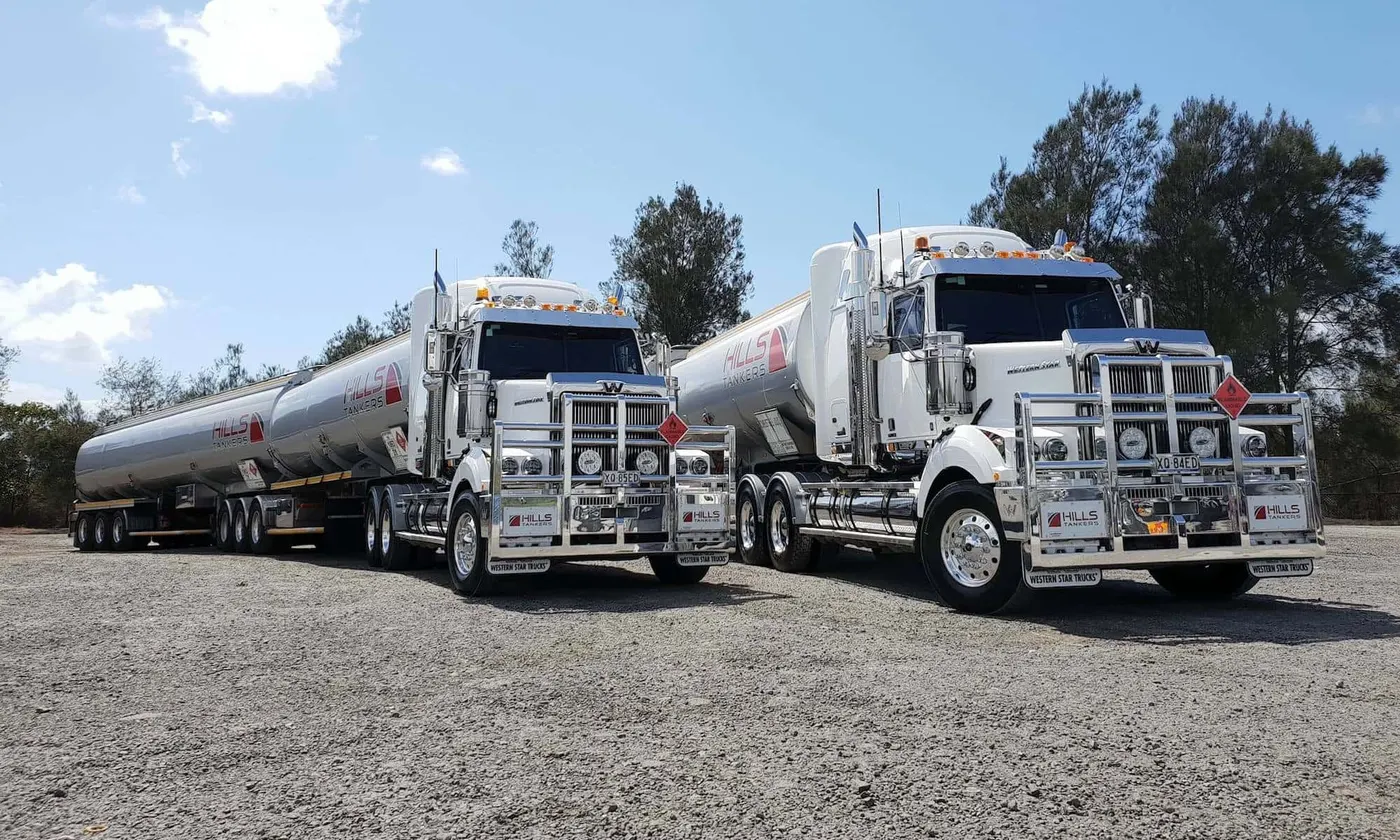 Two Hills Tankers Western Star prime movers with tanker trailers parked side by side