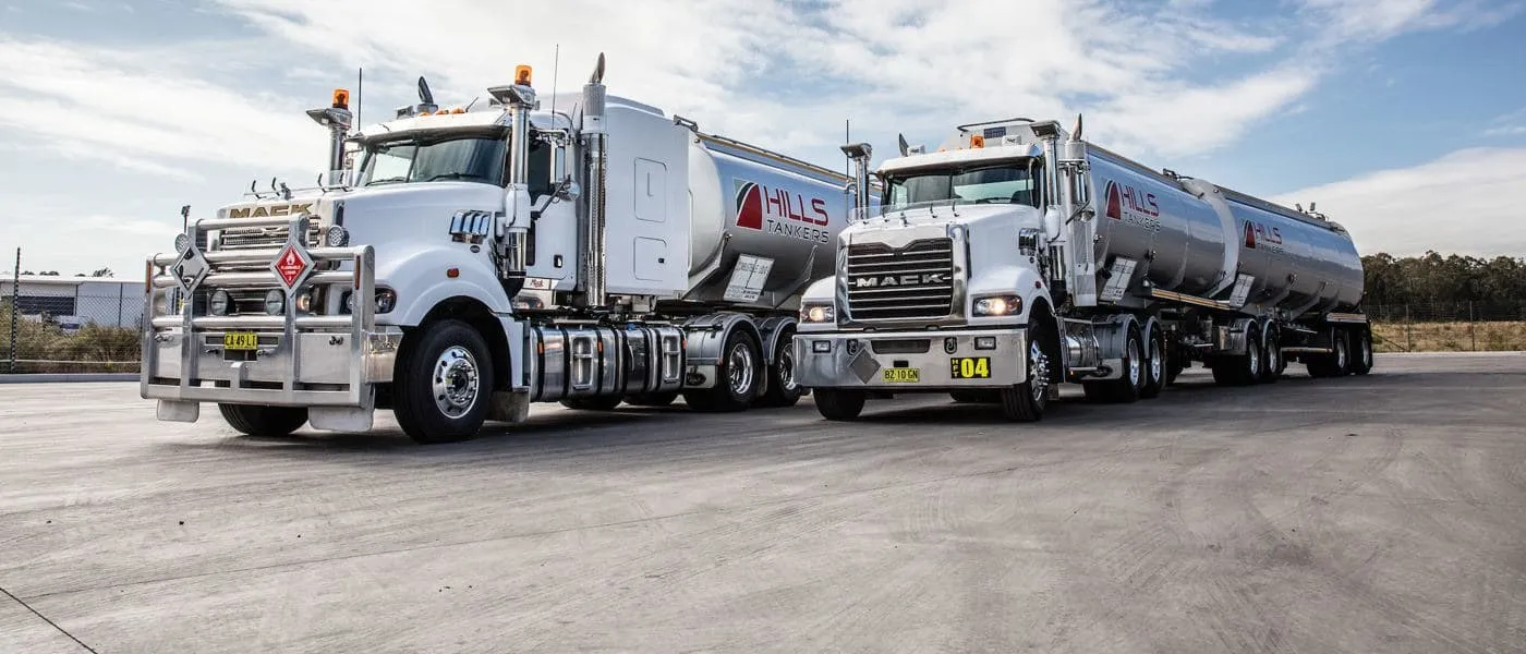 Two Hills Tankers Mack trucks parked side by side