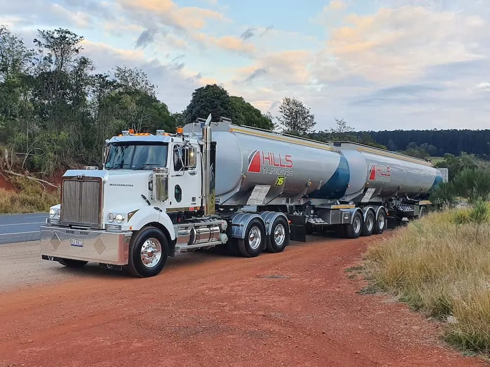 Hills Tankers Western Star double combination parked on red dirt